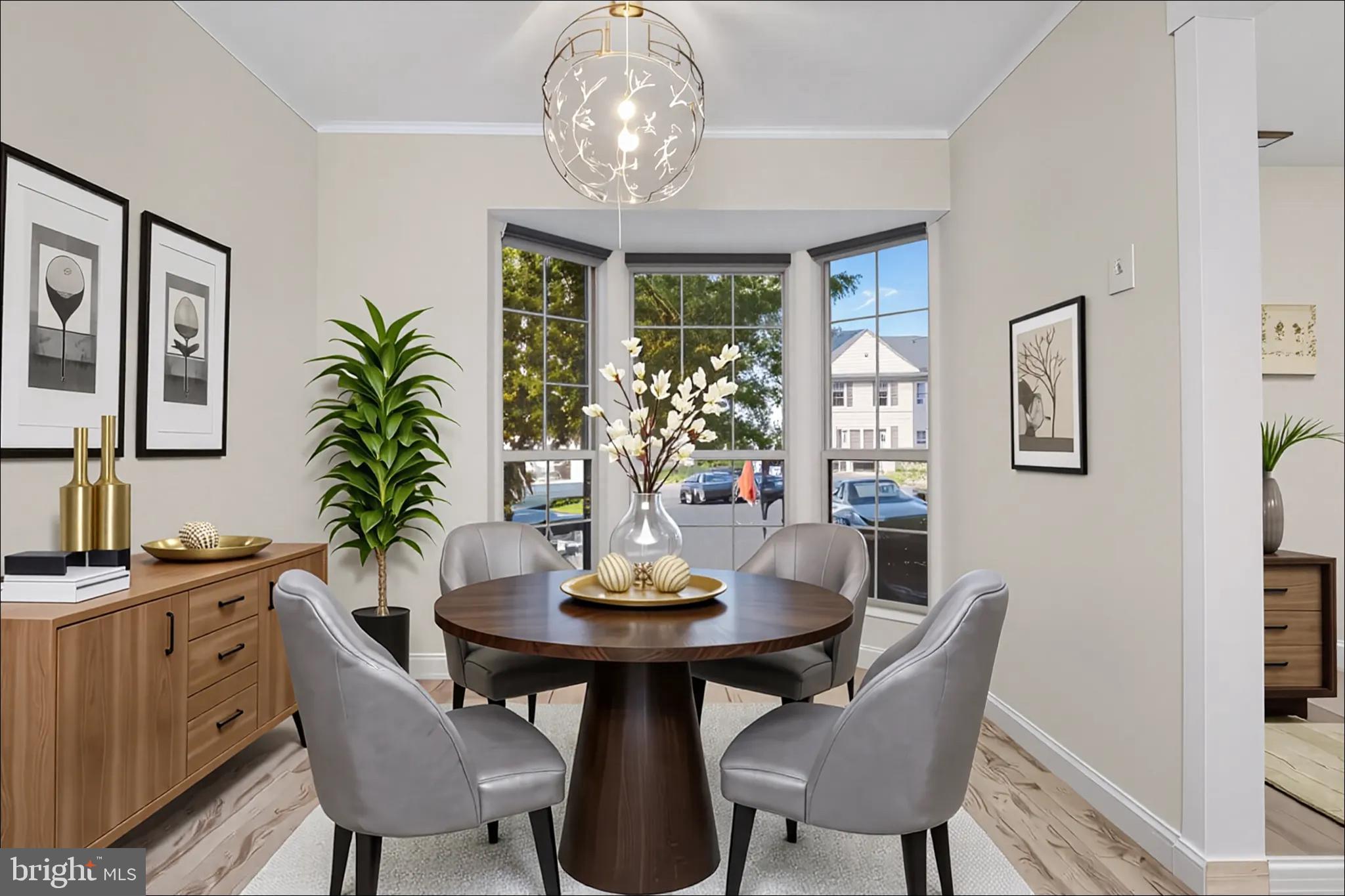 14801 Hammersmith Circle Silver Spring, MD 20906 - Photo 8 of 29 a view of a dining room with furniture window and wooden floor