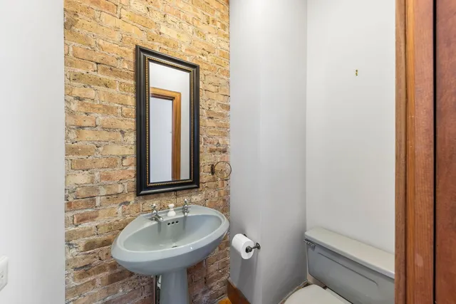 a bathroom with a sink and a toilet