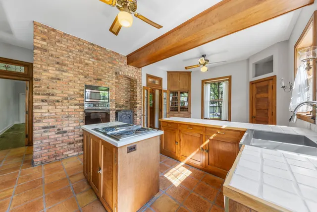 a view of a dinning room with a kitchen