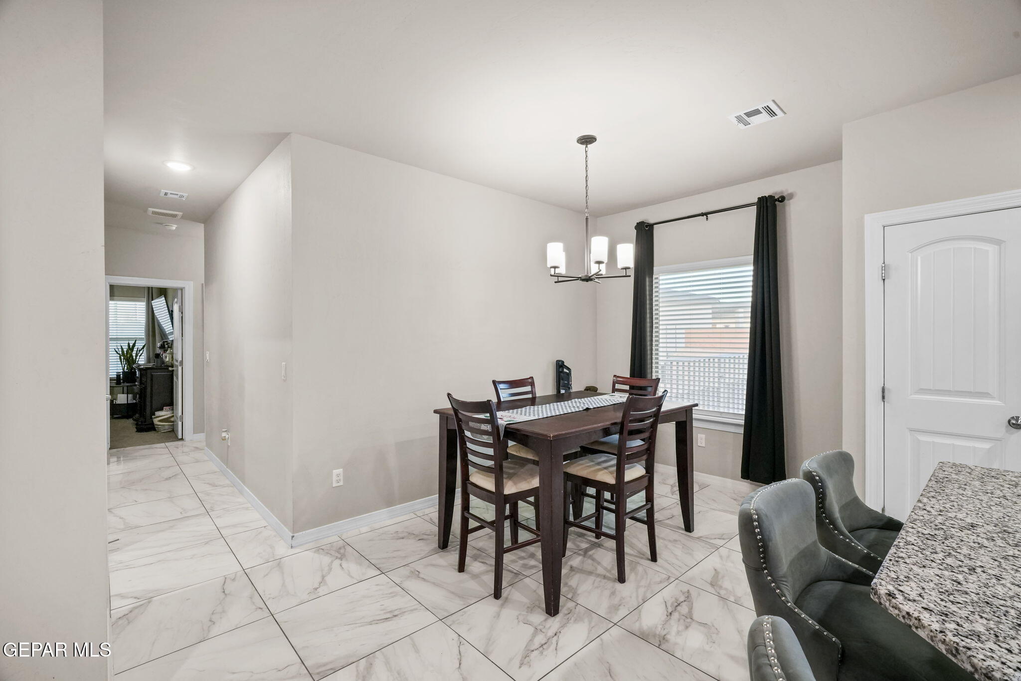356 Plateau Drive Socorro, TX 79927 - Photo 12 of 51 a view of a livingroom with furniture and window