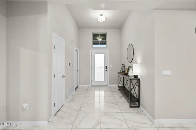 a view of a hallway with a white walls