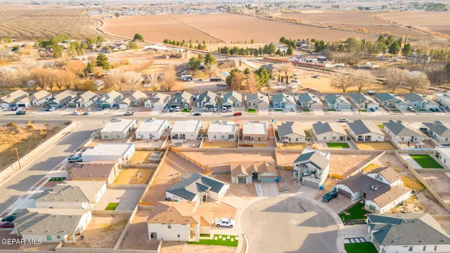 an aerial view of residential building and parking space