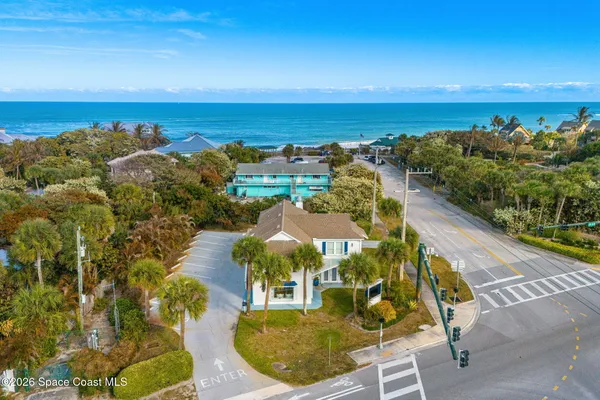 a view of a swimming pool with an ocean view