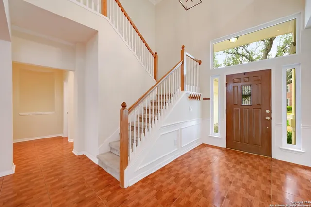 a view of an entryway with staircase