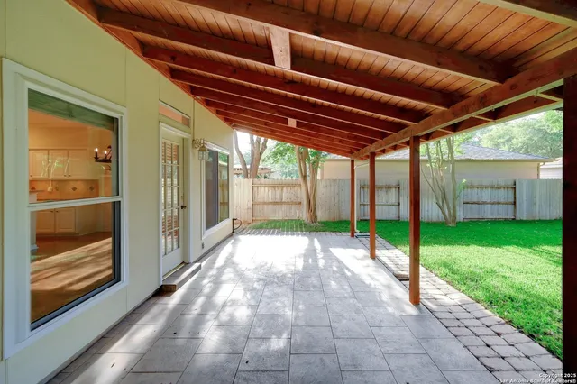 a view of a backyard with a small cabin
