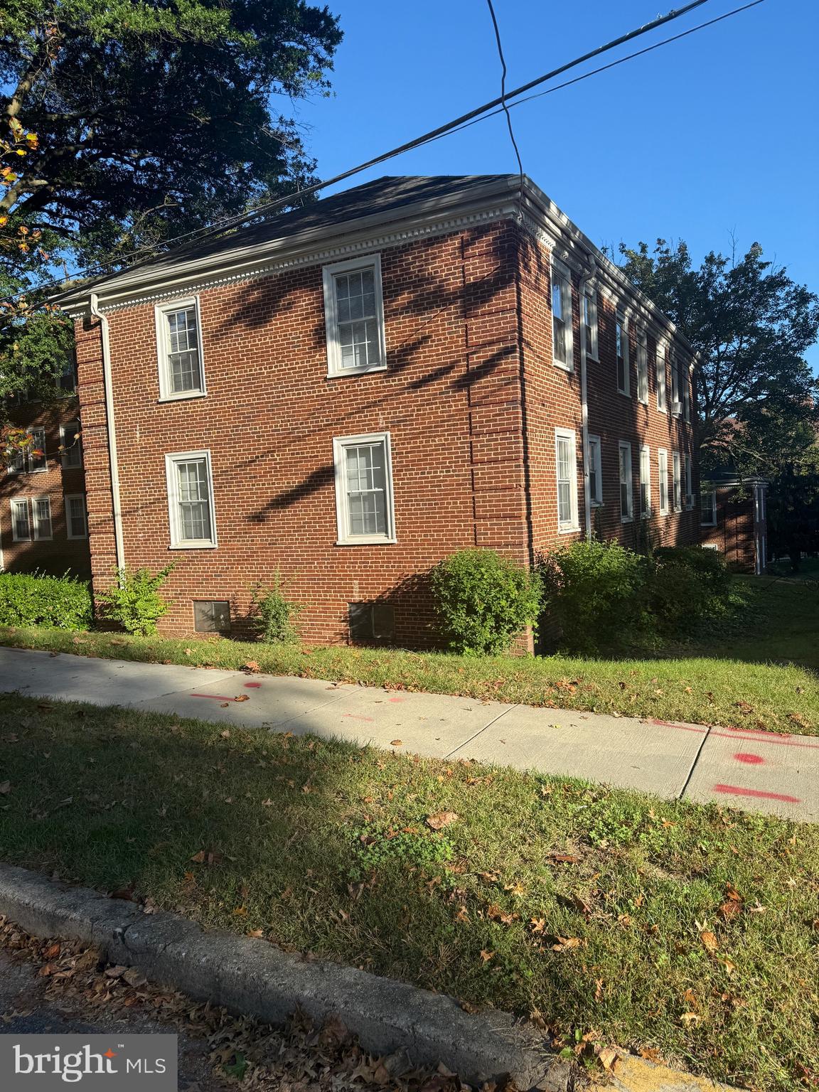 2711 Terrace Road Southeast, Unit 301 Washington, DC 20020 - Photo 3 of 6 a view of a house with a yard