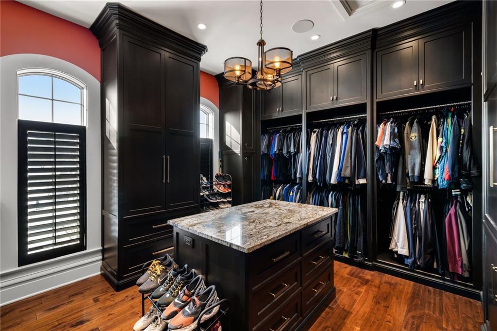 435 Myoma Road Mars, PA 16046 - Photo 22 of 50 Custom dressing room with an island, glass-front cabinetry and beautifully organized storage.