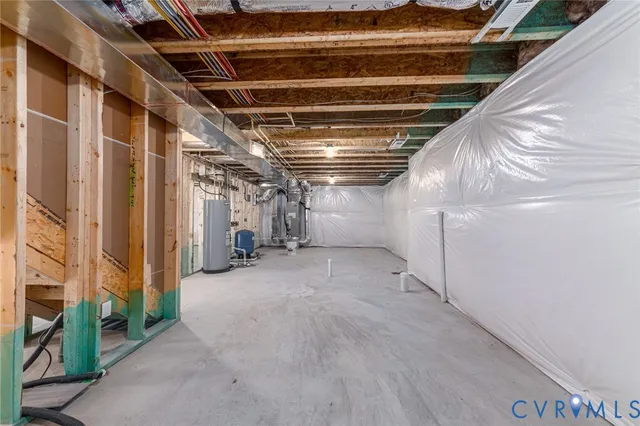 a view of empty room with wooden walls