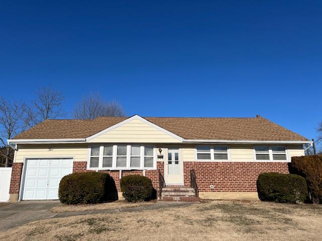 2 Lee Place Old Bethpage, NY 11804 - Photo 1 of 1 a front view of a house with a garden