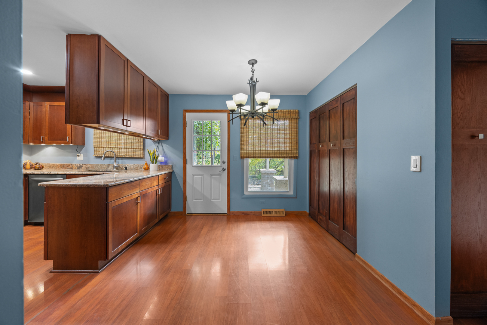 1567 California Street Elk Grove Village, IL 60007 - Photo 11 of 29 a kitchen with a sink stove and cabinets
