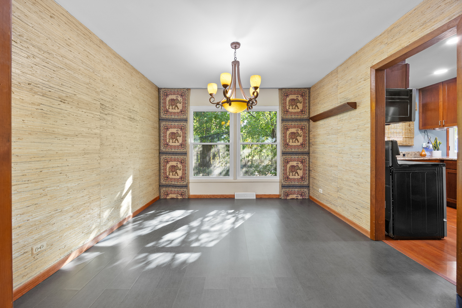1567 California Street Elk Grove Village, IL 60007 - Photo 6 of 29 wooden floor in an empty room with a window