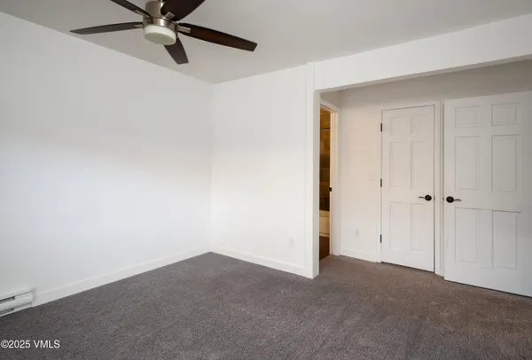 a view of a small space with a fan