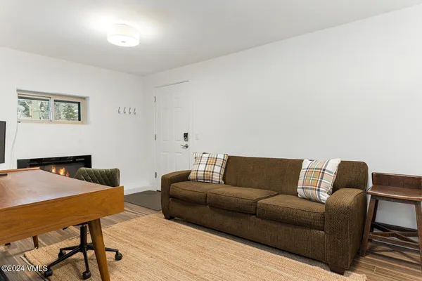 a living room with a couch and a table