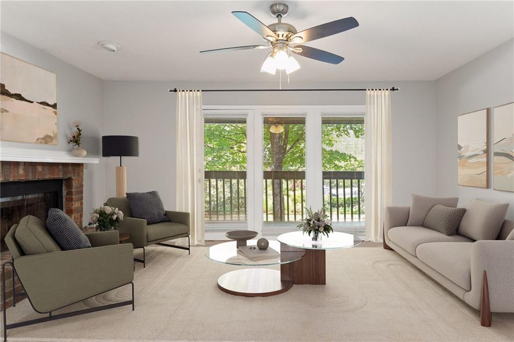 1009 McClelen Way Decatur, GA 30033 - Photo 2 of 24 a living room with furniture and a large window