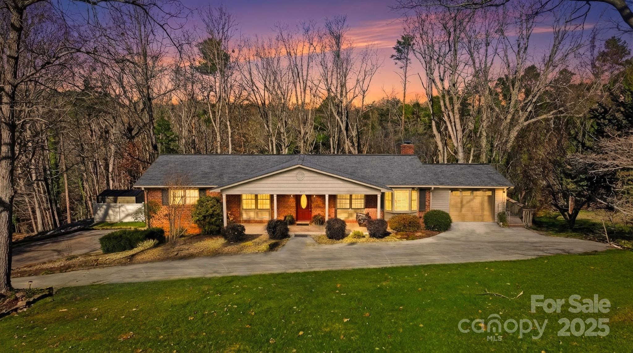 315 Skyline Road Hickory, NC 28601 - Photo 1 of 48 a front view of a house with garden