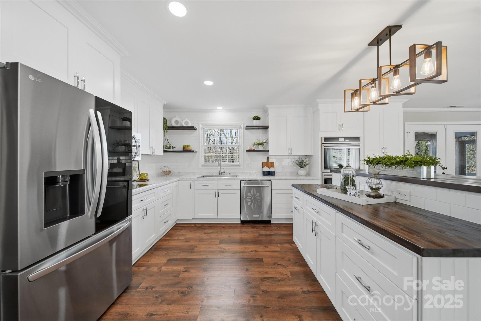 315 Skyline Road Hickory, NC 28601 - Photo 15 of 48 a kitchen with stainless steel appliances granite countertop a refrigerator and a sink