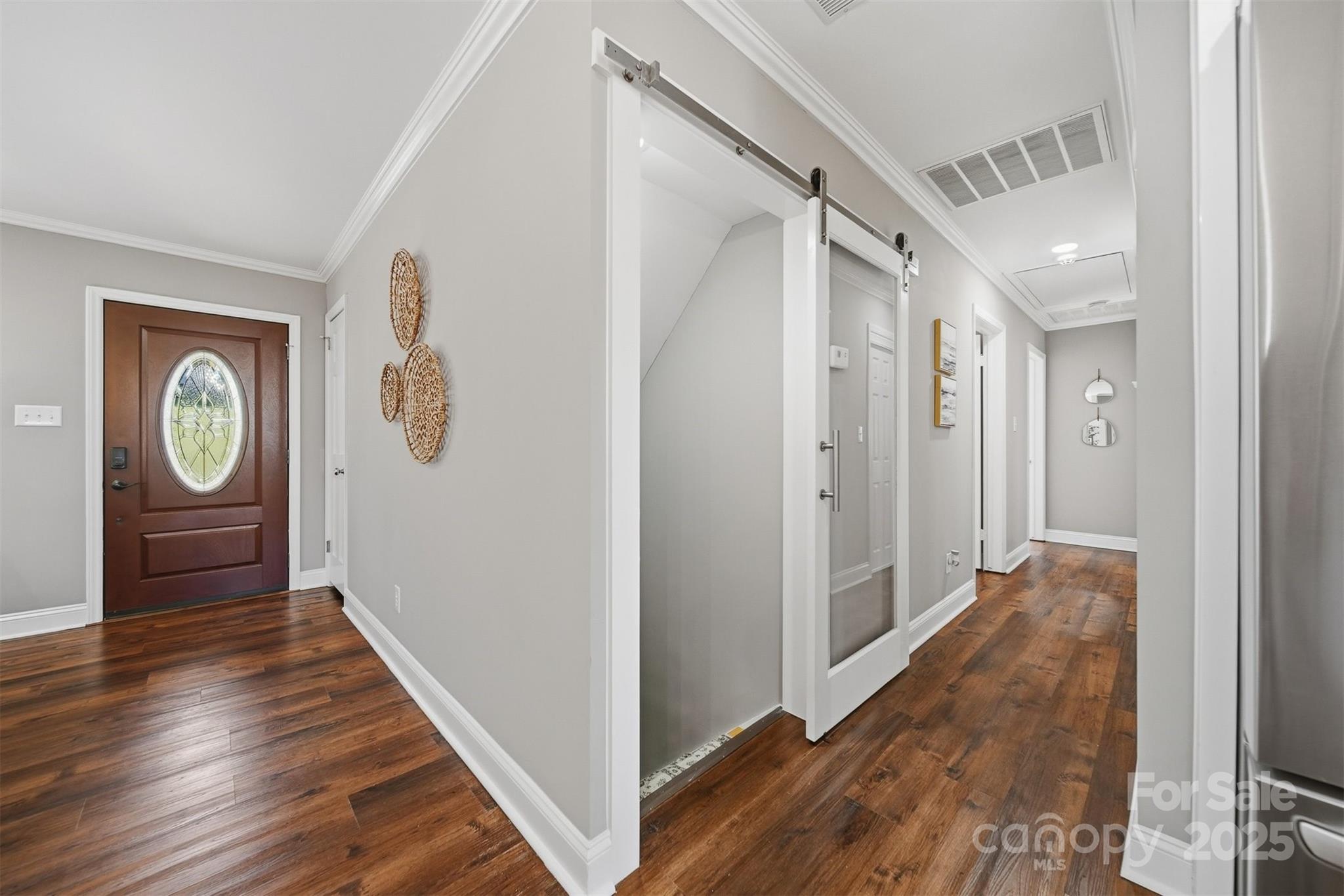 315 Skyline Road Hickory, NC 28601 - Photo 20 of 48 a view of a hallway with wooden floor