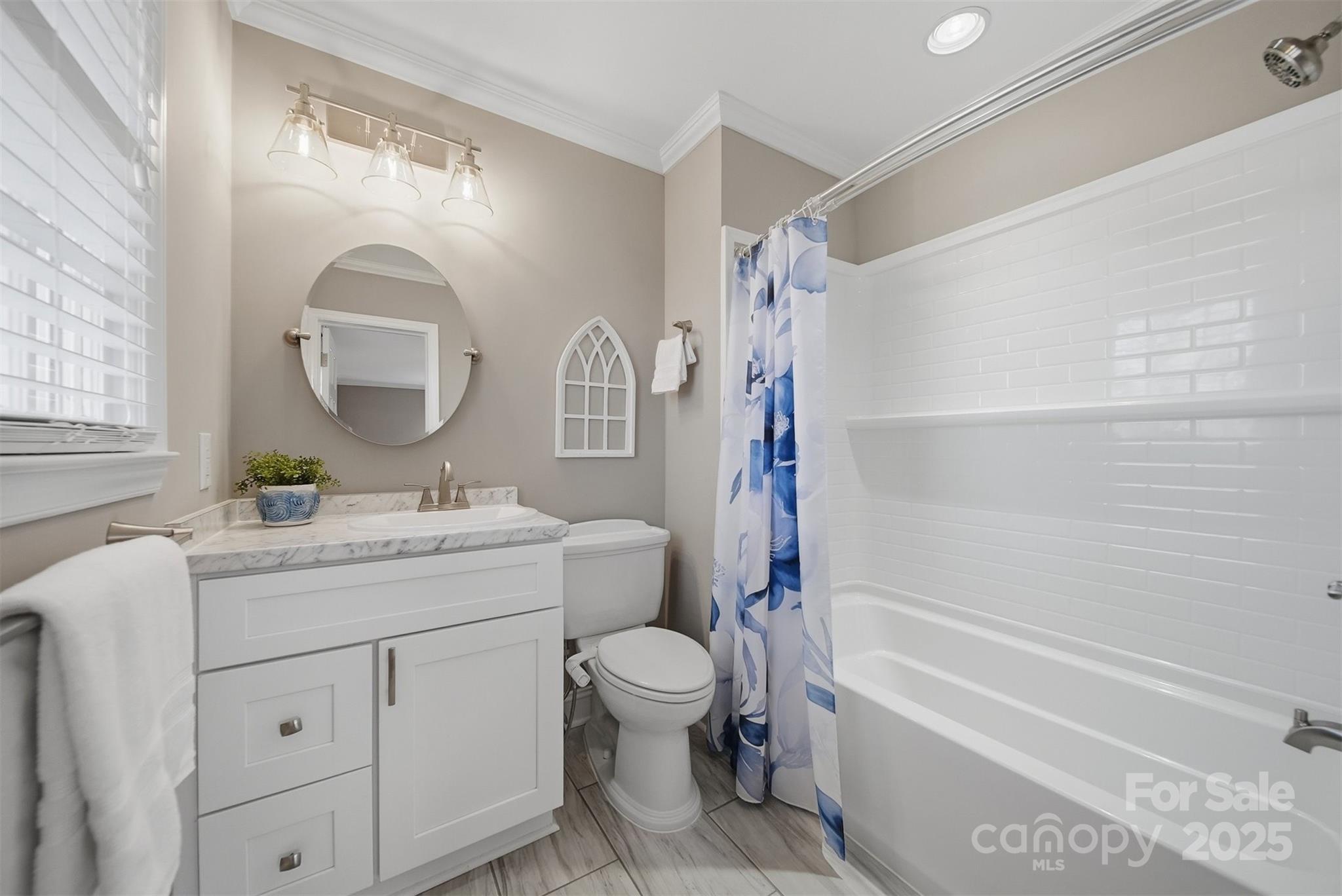 315 Skyline Road Hickory, NC 28601 - Photo 23 of 48 a bathroom with a toilet sink vanity granite and bathtub