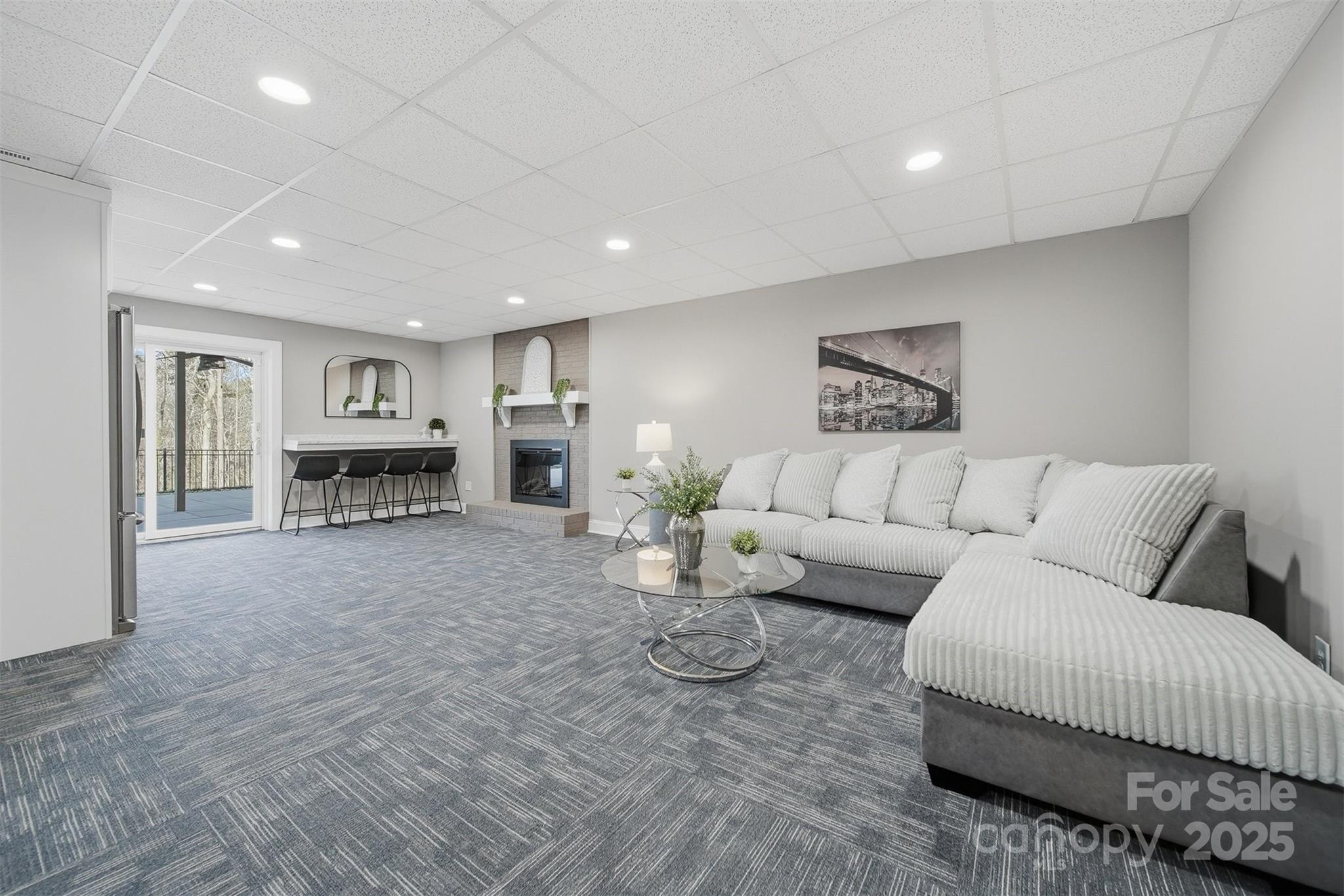 315 Skyline Road Hickory, NC 28601 - Photo 29 of 48 a living room with furniture and a fireplace