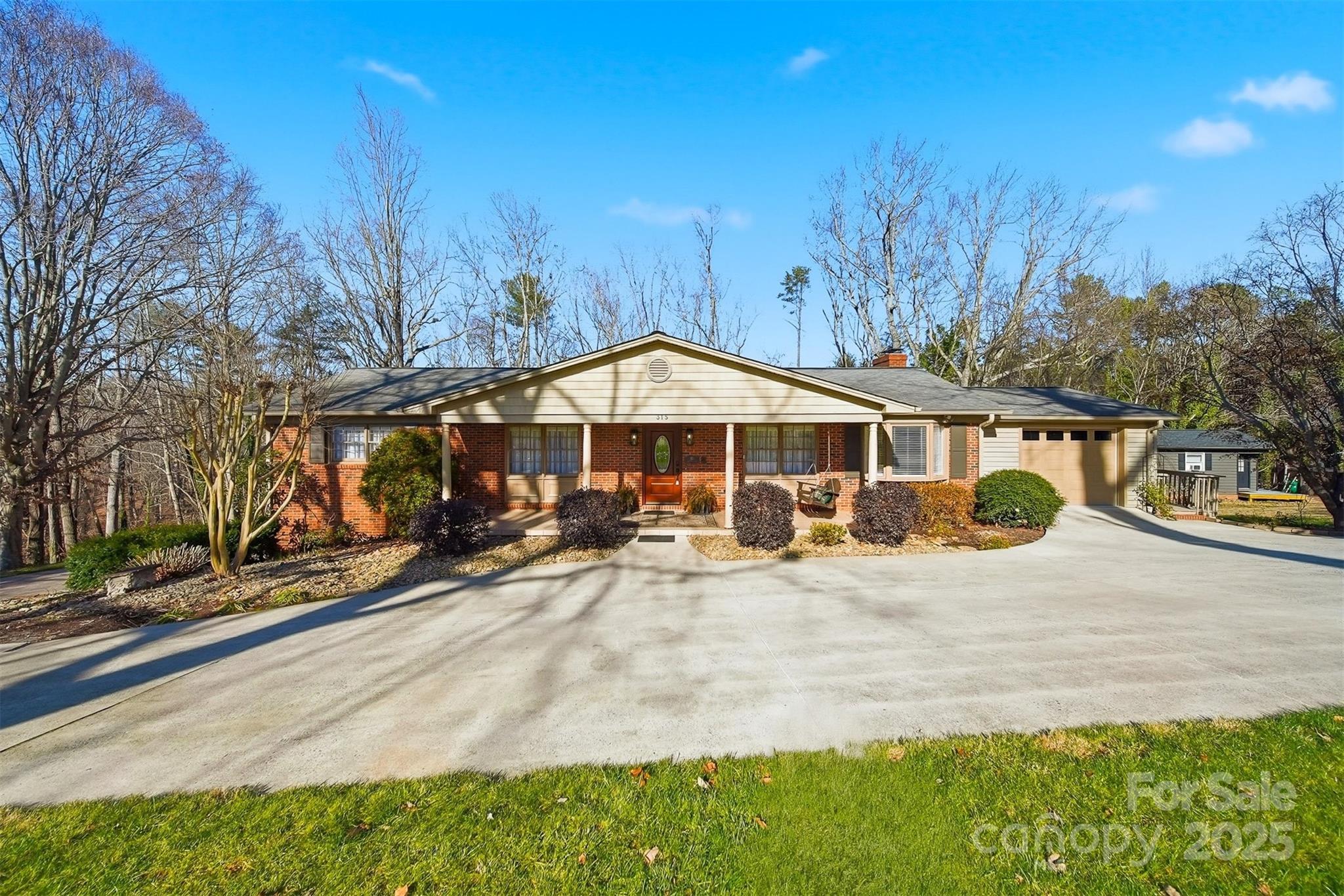 315 Skyline Road Hickory, NC 28601 - Photo 36 of 48 a view of a house with yard and sitting area