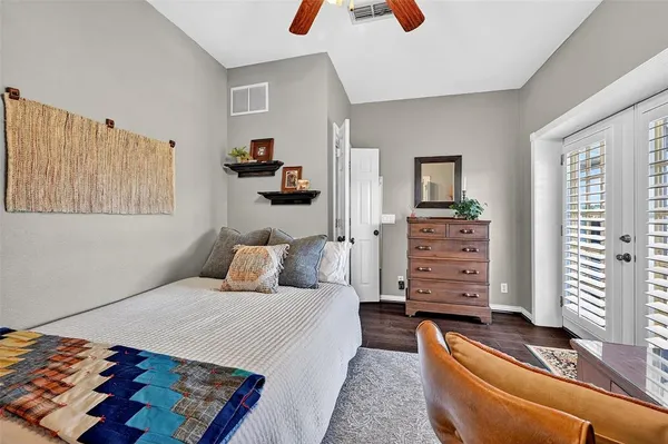 a bedroom with furniture and a couch