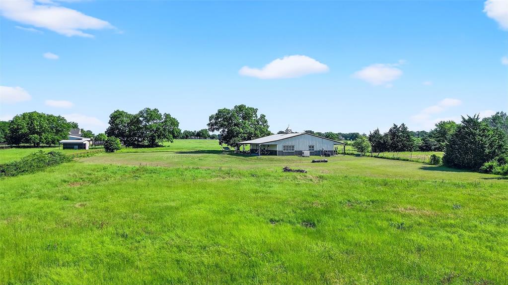 12041 Bell Road Pilot Point, TX 76258 - Photo 37 of 38 a front view of a house with a yard