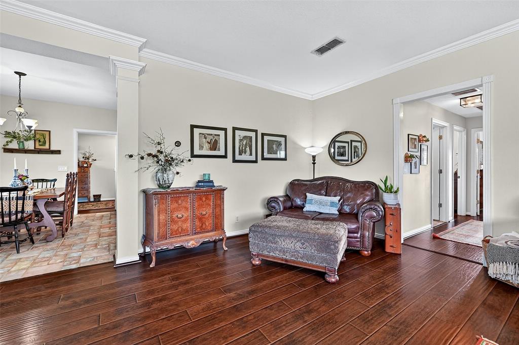 12041 Bell Road Pilot Point, TX 76258 - Photo 8 of 38 a living room with furniture and a wooden floor