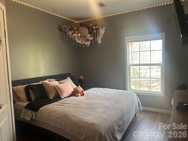 158 Cooks Lake Road Gastonia, NC 28056 - Photo 19 of 27 a bedroom with a bed and a window
