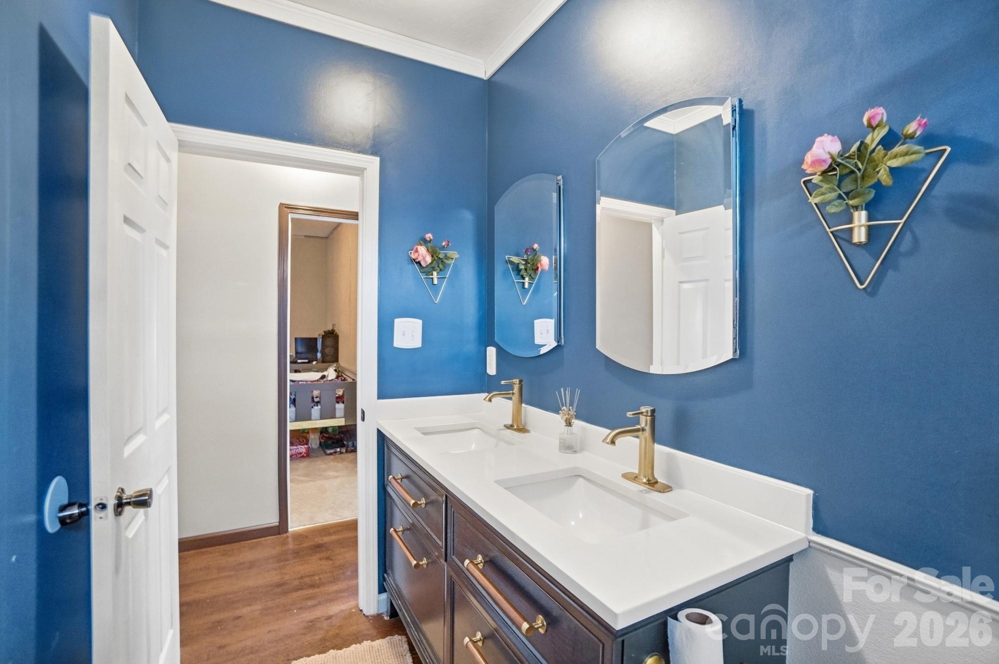 158 Cooks Lake Road Gastonia, NC 28056 - Photo 23 of 27 a bathroom with a sink vanity and a mirror