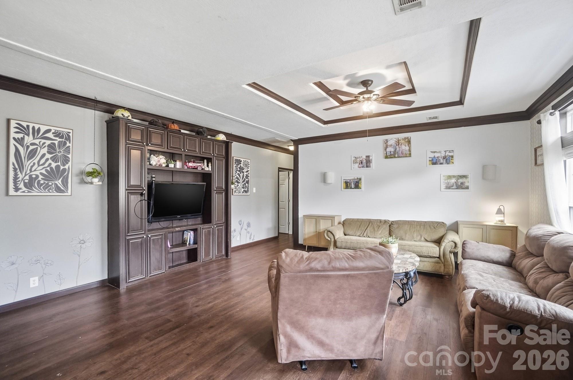 158 Cooks Lake Road Gastonia, NC 28056 - Photo 8 of 27 a living room with furniture and a flat screen tv