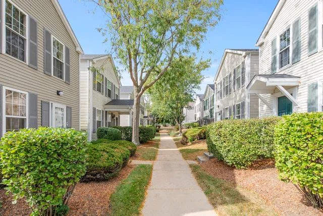 a view of a building with a garden