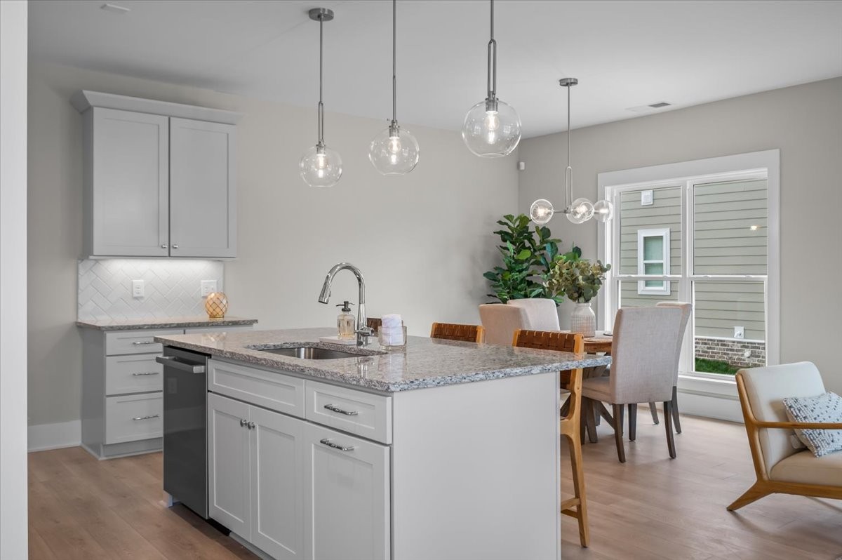 3045 A Hillside Road Nashville, TN 37207 - Photo 10 of 37 a kitchen with cabinets table and chairs