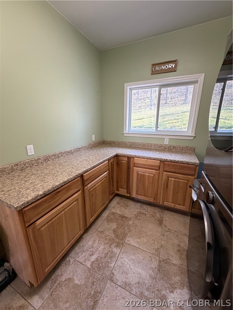 184 State Park Road Brumley, MO 65017 - Photo 44 of 99 Great Counter Space in Laundry Room