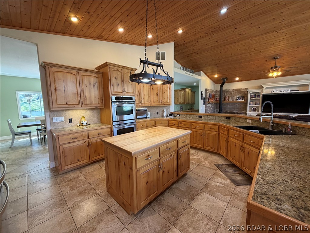 184 State Park Road Brumley, MO 65017 - Photo 8 of 99 Island with Butcher Block Countertop