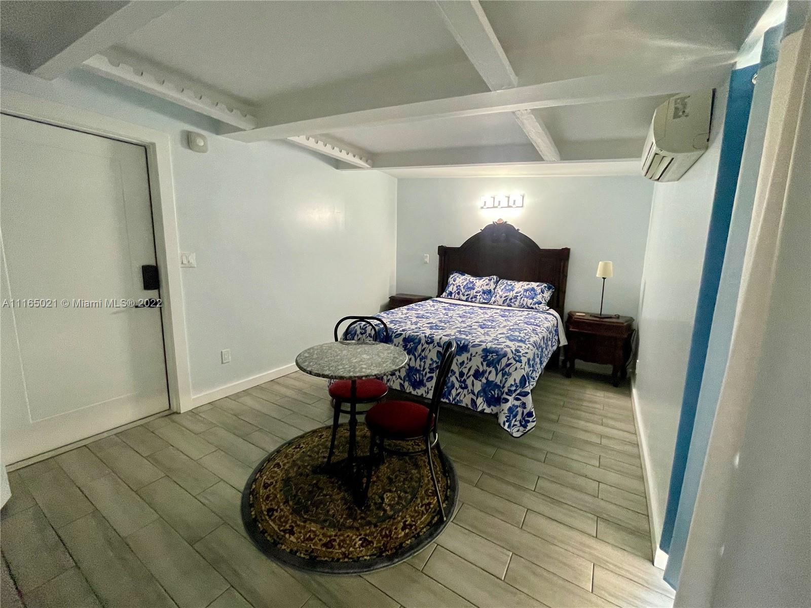 3 Sunset Lane Lauderdale-by-the-Sea, FL 33062 - Photo 19 of 36 a room with a table and chairs