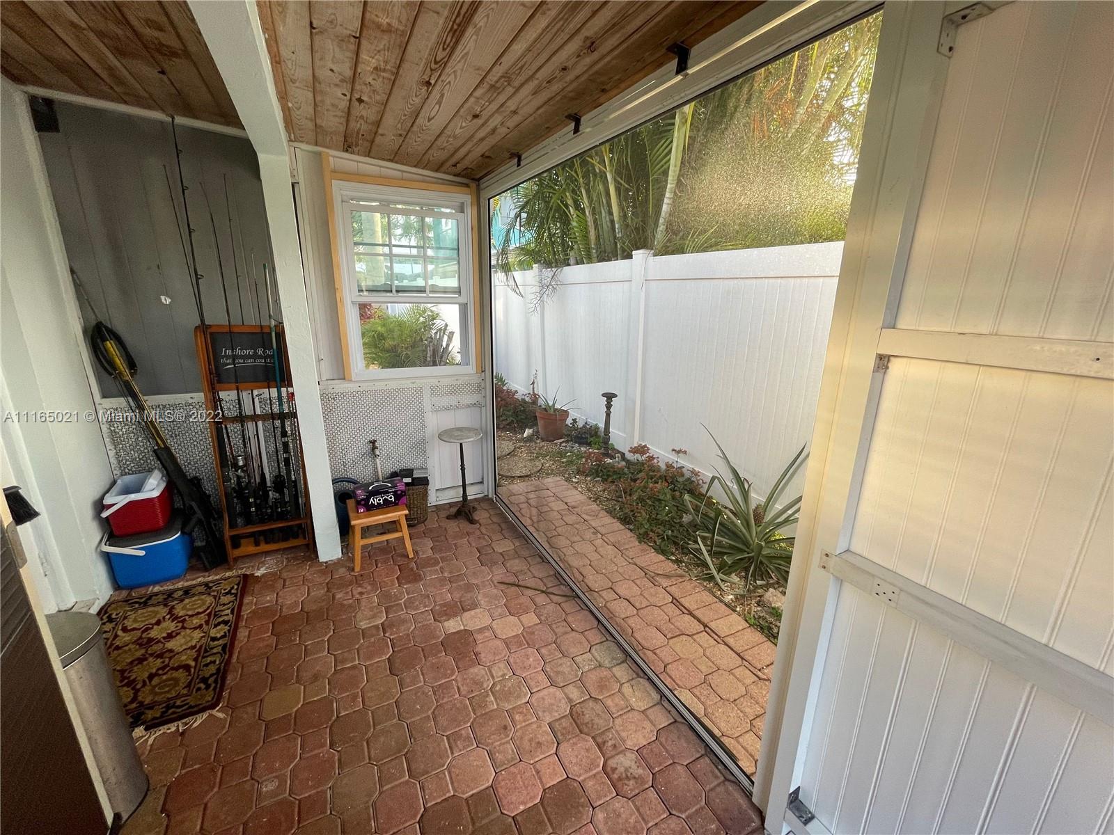 3 Sunset Lane Lauderdale-by-the-Sea, FL 33062 - Photo 31 of 36 a view of outdoor space and porch