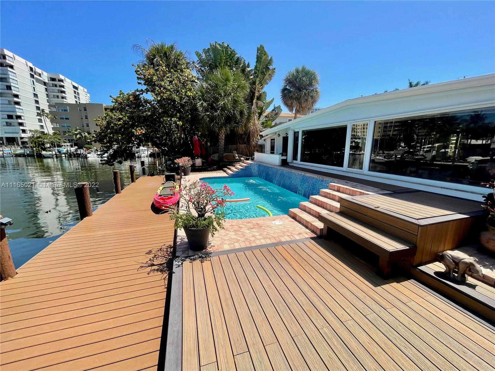 3 Sunset Lane Lauderdale-by-the-Sea, FL 33062 - Photo 36 of 36 a view of a house with lounge chair