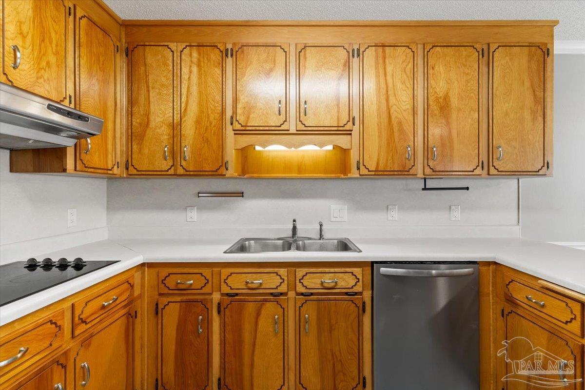 2787 Willow Bend Court Crestview, FL 32539 - Photo 27 of 46 a kitchen with a sink a stove and cabinets