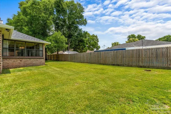 a view of a backyard with a garden