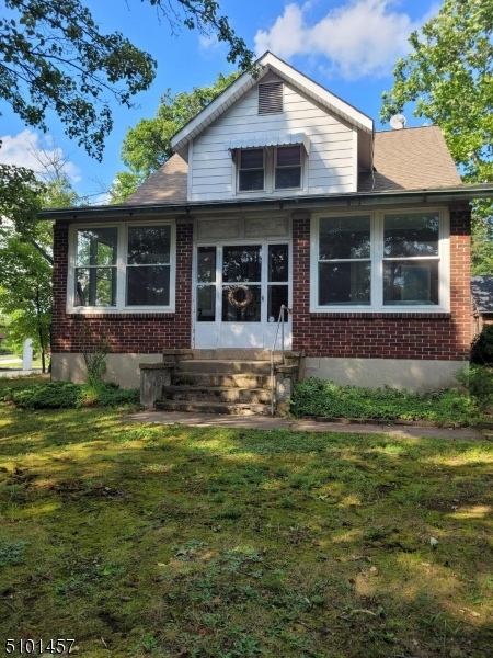 57 Voorhees Corner Road Flemington, NJ 08822 - Photo 1 of 11 a front view of a house with a yard