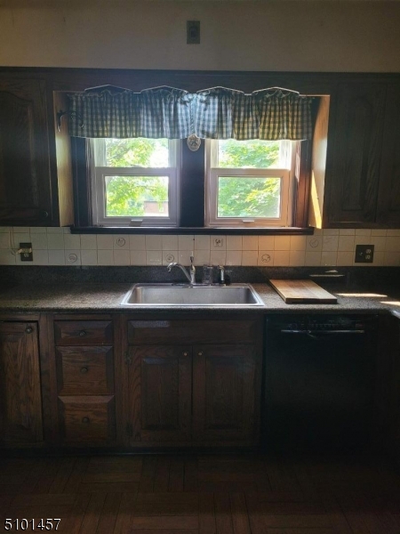 57 Voorhees Corner Road Flemington, NJ 08822 - Photo 3 of 11 a kitchen with a sink window and cabinets
