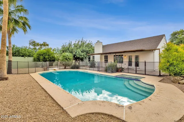 an aerial view of a house with a garden