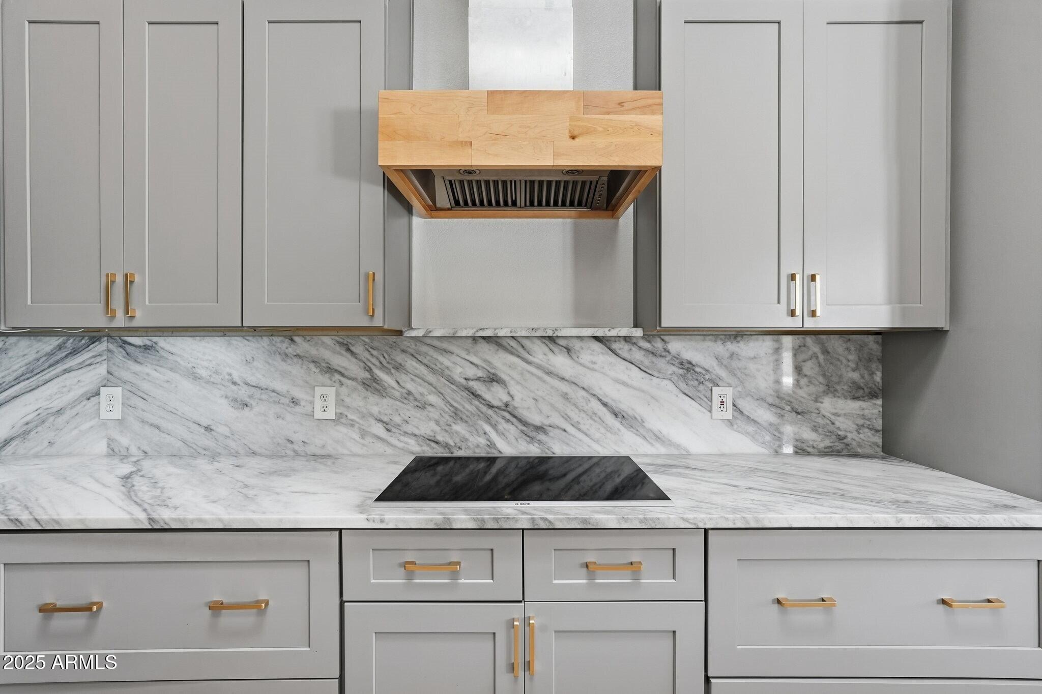 11415 North 44th Street Phoenix, AZ 85028 - Photo 20 of 56 a kitchen with granite countertop cabinets and white appliances