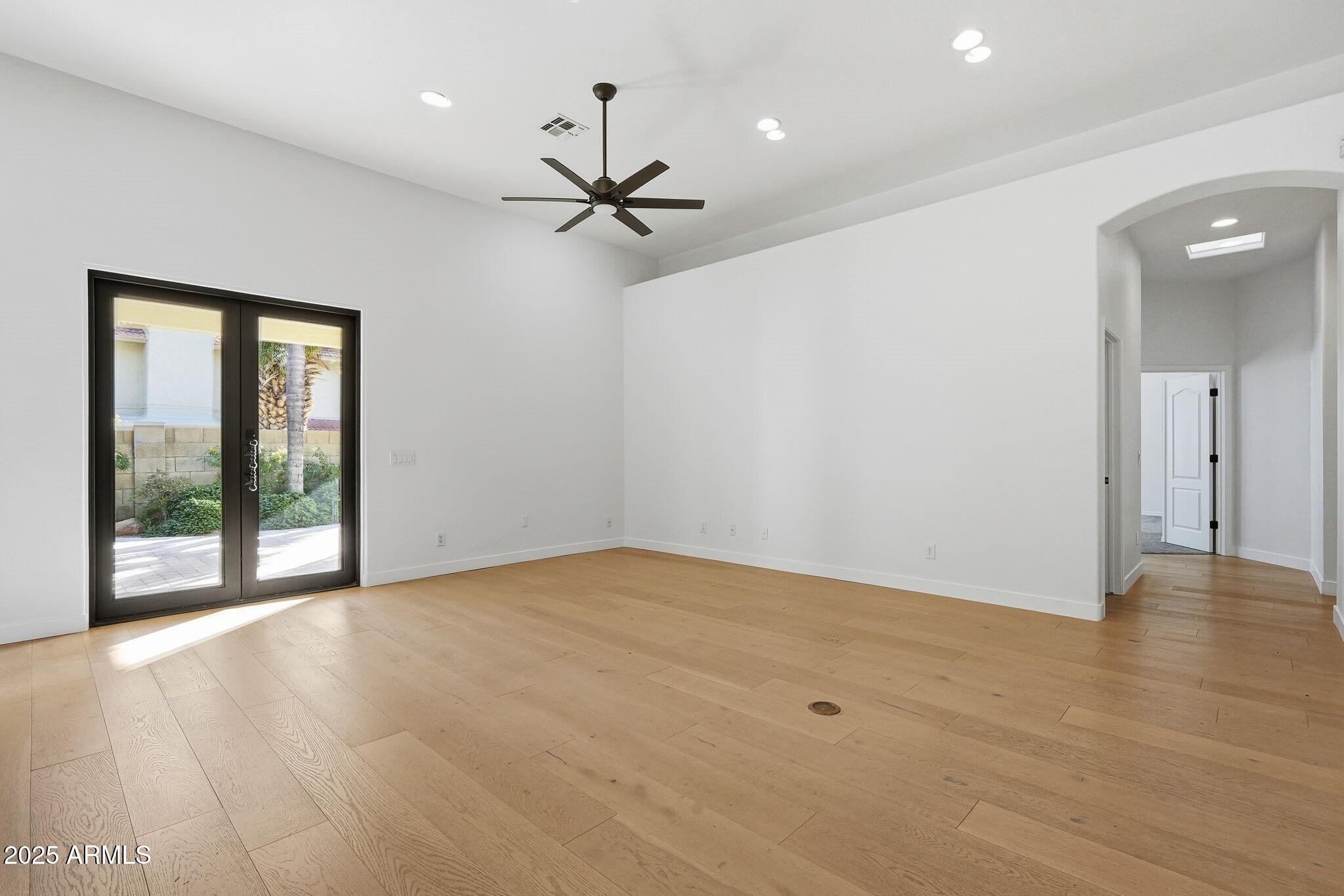 11415 North 44th Street Phoenix, AZ 85028 - Photo 24 of 56 a view of an empty room with a window