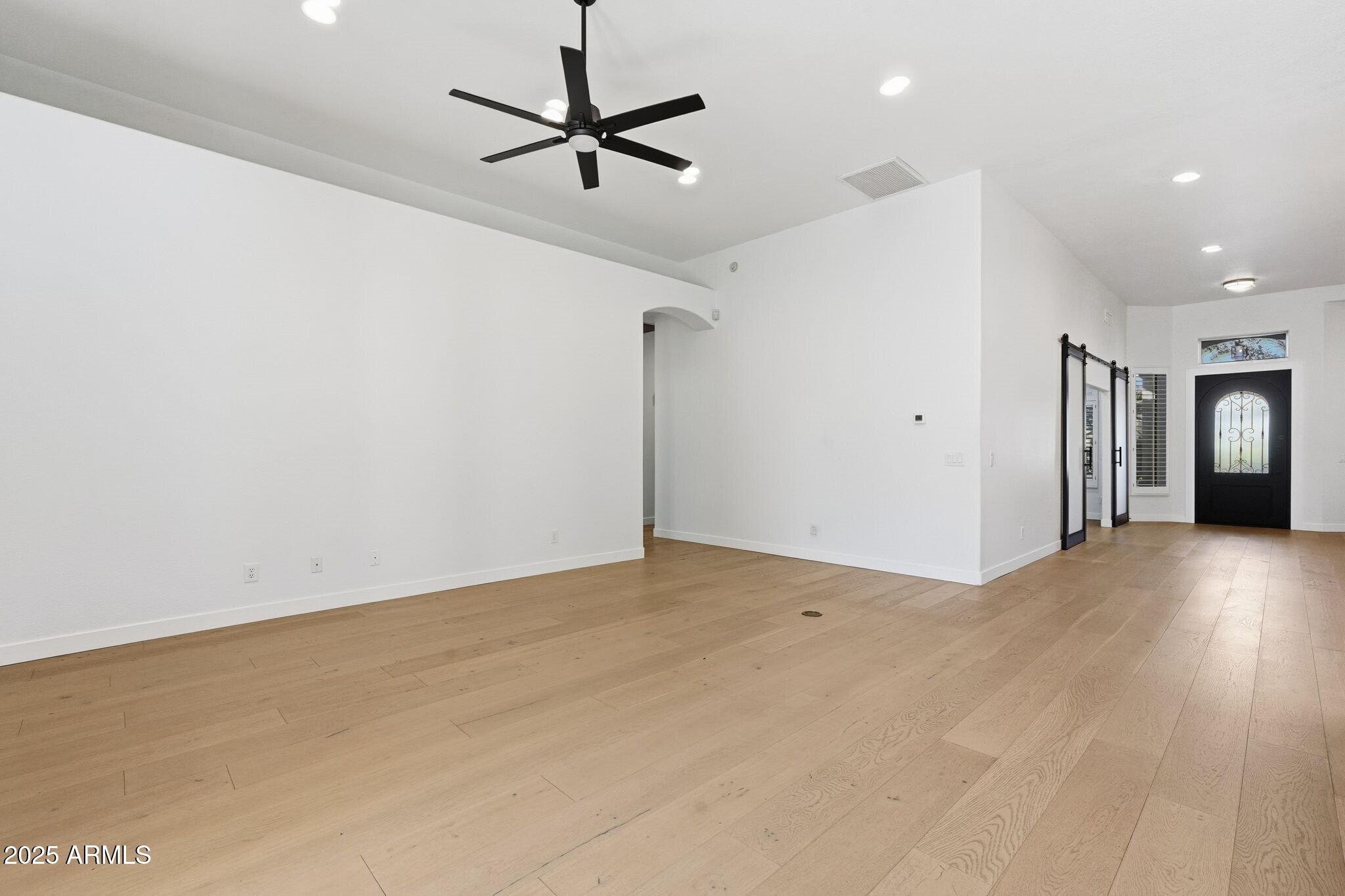 11415 North 44th Street Phoenix, AZ 85028 - Photo 25 of 56 a view of an empty room with a window