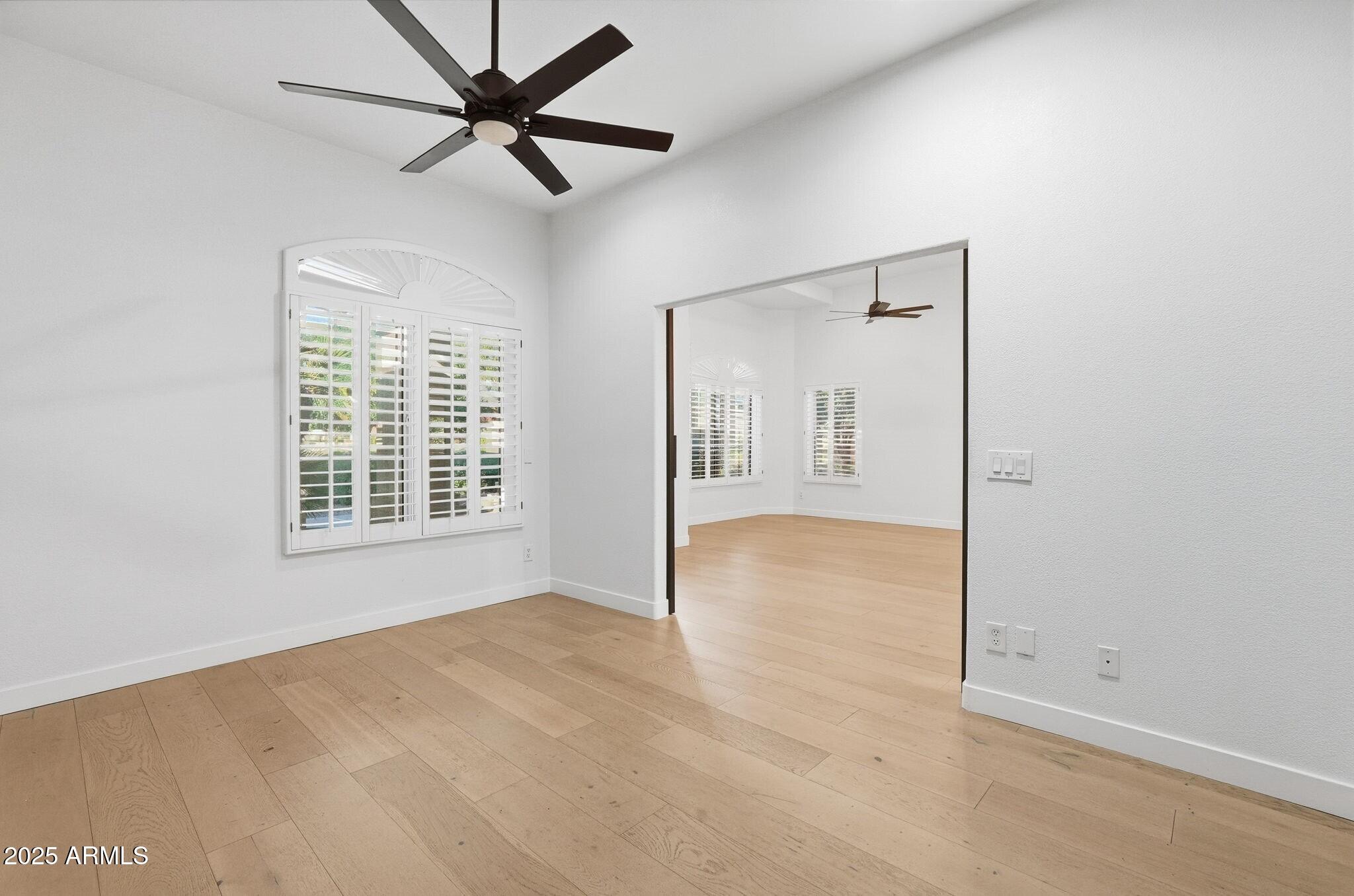 11415 North 44th Street Phoenix, AZ 85028 - Photo 27 of 56 a view of an empty room with a window