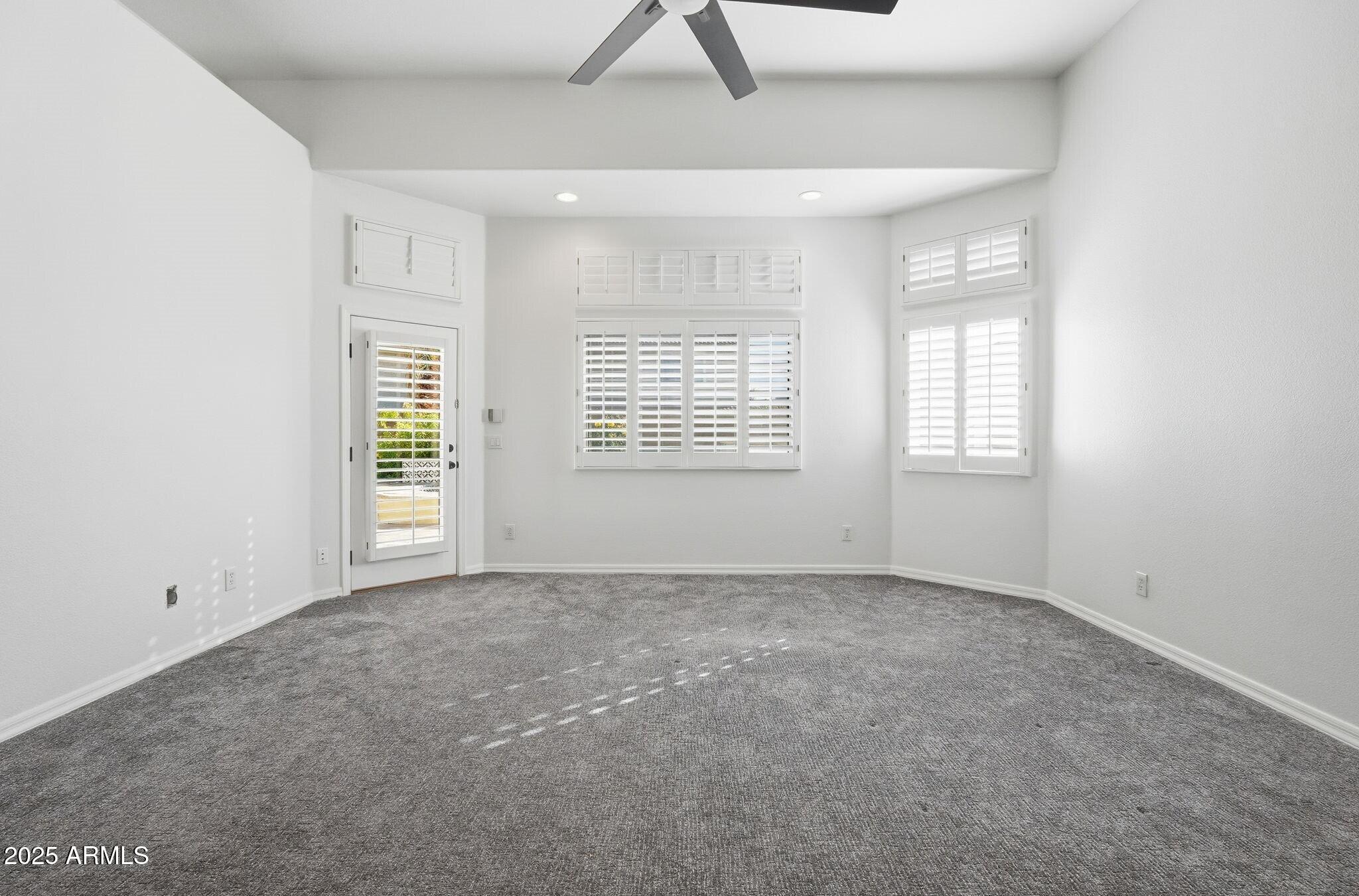 11415 North 44th Street Phoenix, AZ 85028 - Photo 30 of 56 a view of an empty room with a window