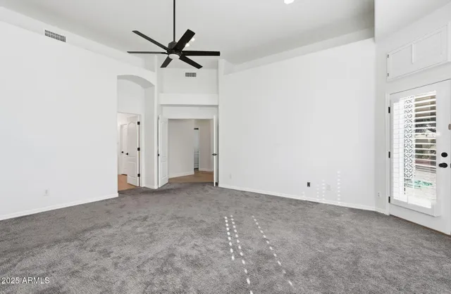 a bathroom with a bathtub sink and mirror