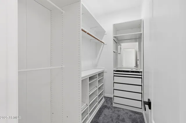 a utility room with sink dryer and washer