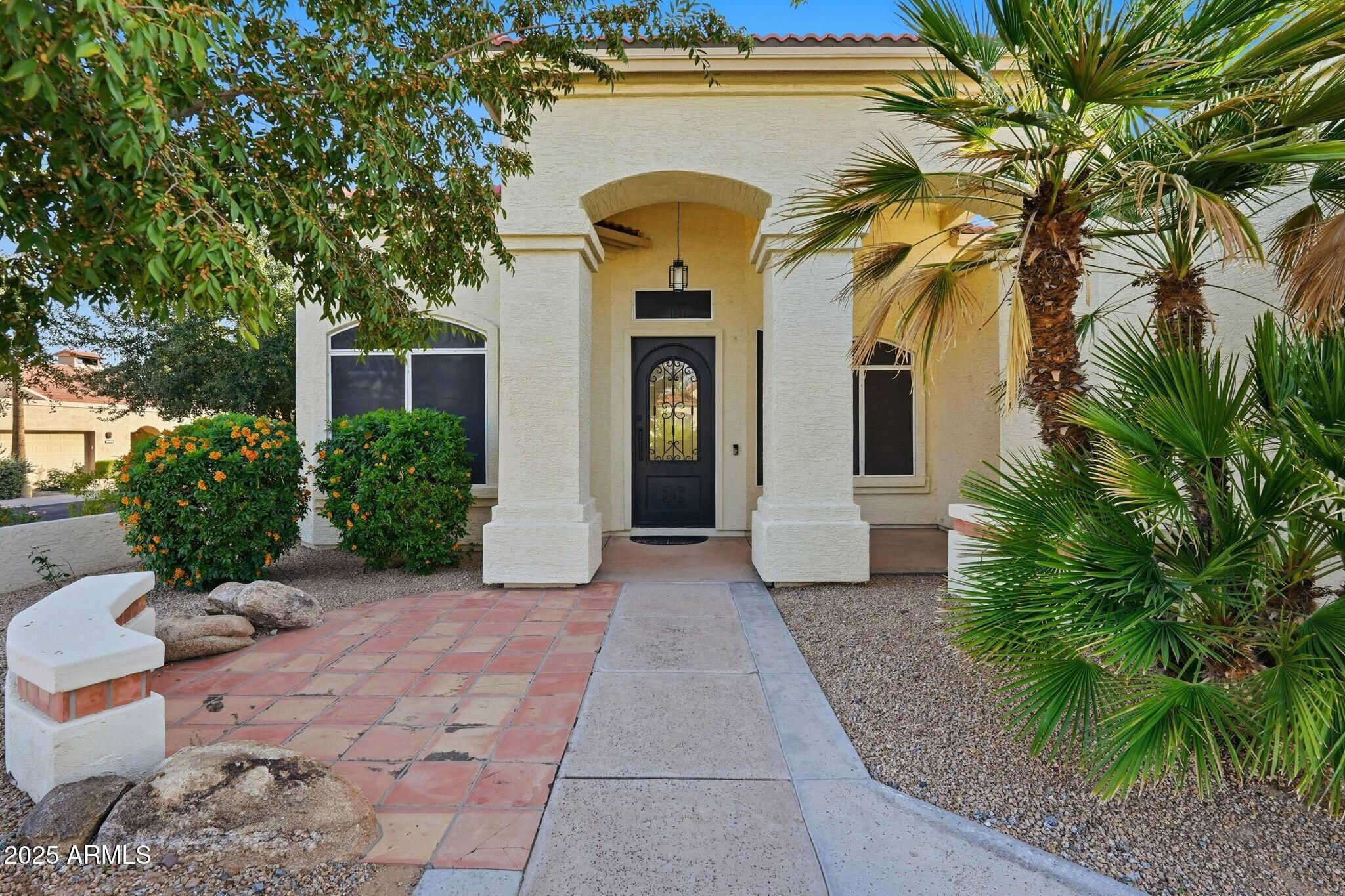 11415 North 44th Street Phoenix, AZ 85028 - Photo 3 of 56 a view of a house with a patio